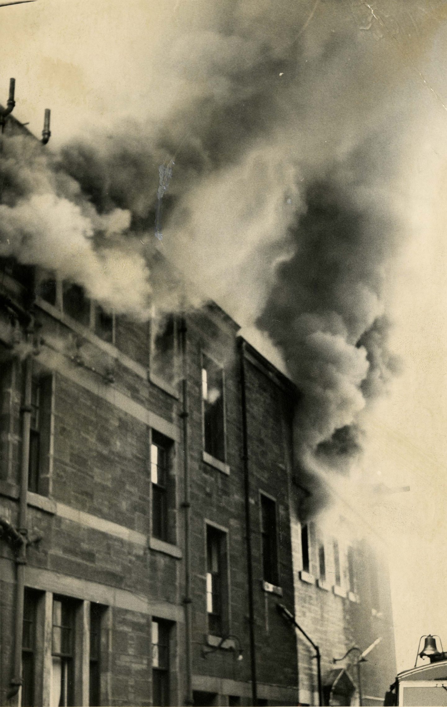 Smoke pours from the building as The Rep is engulfed by flames in 1963.