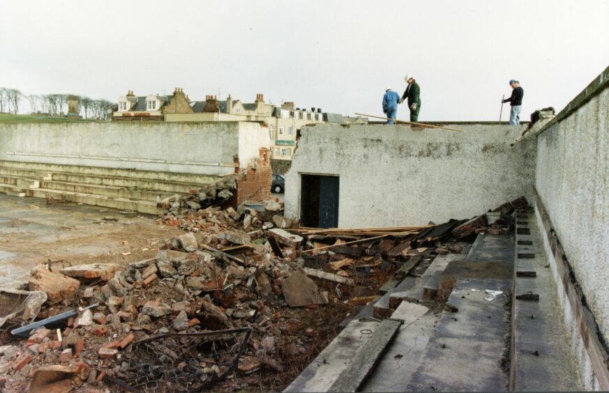 Work starts to demolish the once-famous swimming pool back in 1993. Image: DC Thomson.