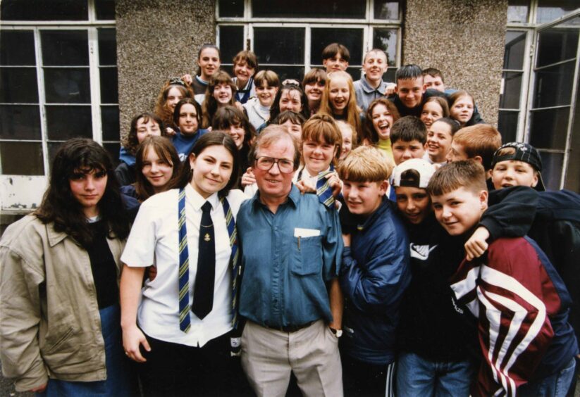 Rector Paul Taylor with some of the senior pupils when the school finally closed in June 1996. Image: DC Thomson.