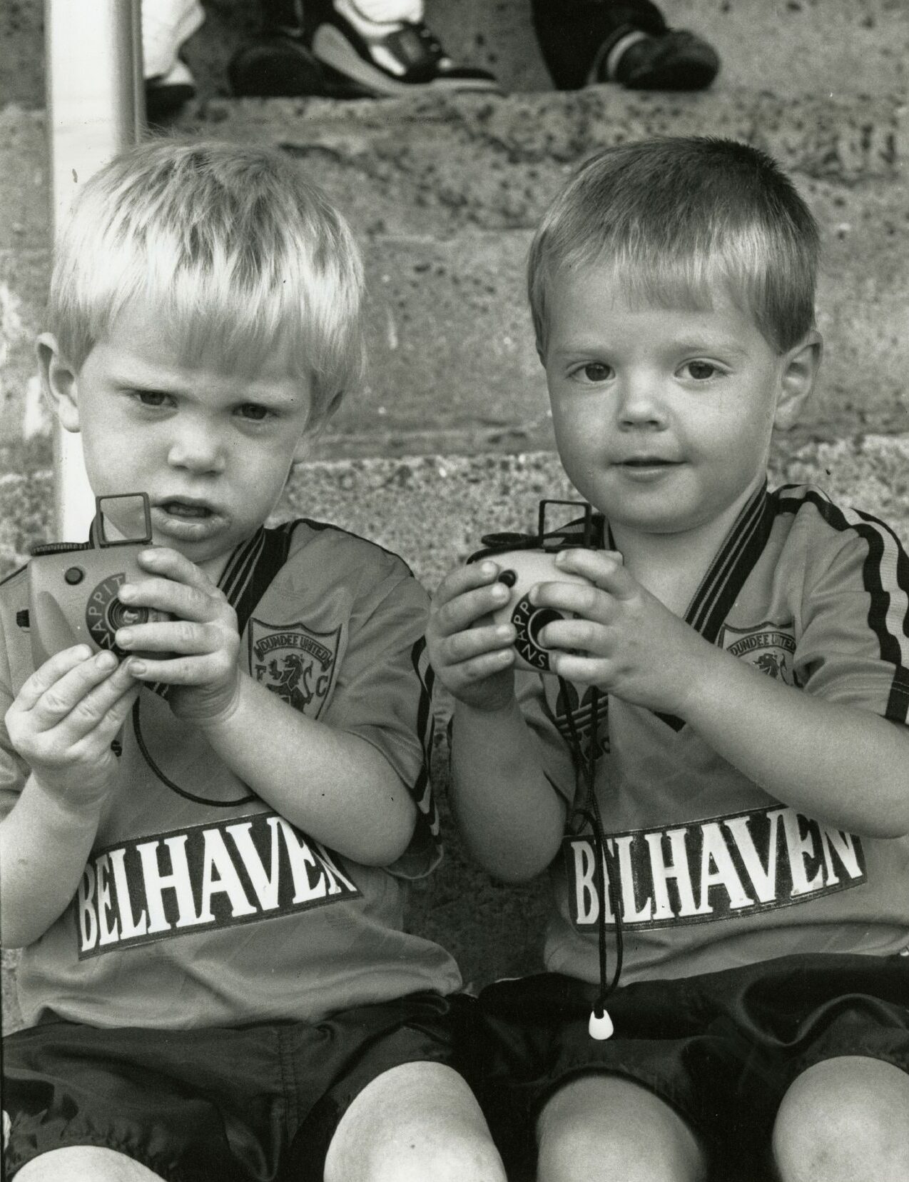 Young boys Kyle Payne and John Swindells getting ready to photograph their heroes in 1989