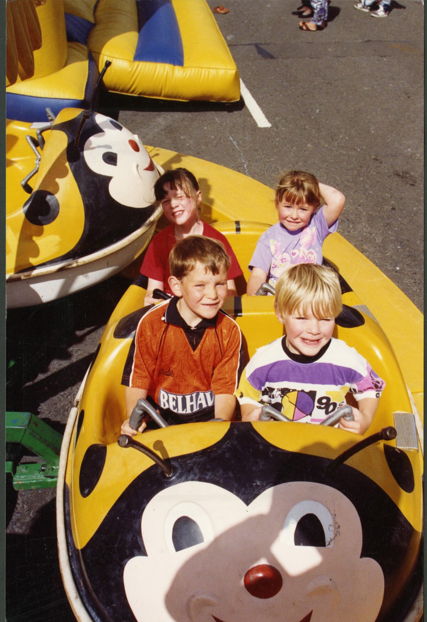 Youngsters enjoying the carnival rides at the 1992 Dundee United open day. Image: DC Thomson.