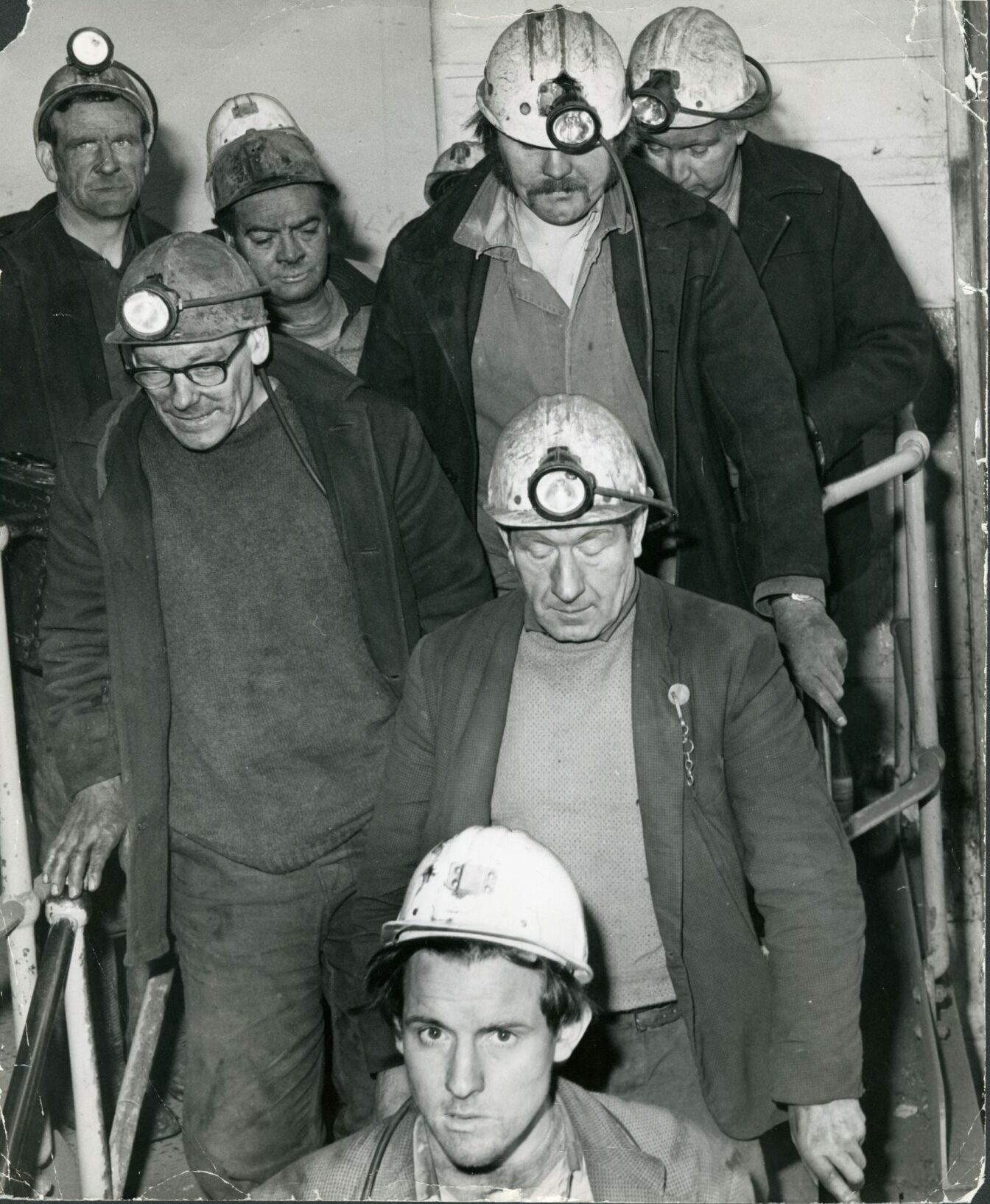 Strain on the faces of one of the rescue squads that fought to save their stricken colleagues. Image: DC Thomson.