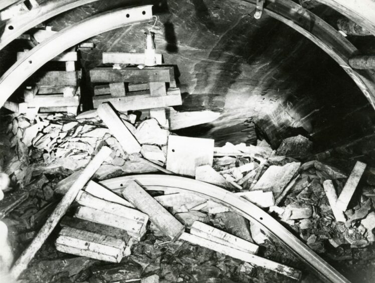 Some of the debris from the fall can be seen following the rescue operation. Image: DC Thomson.