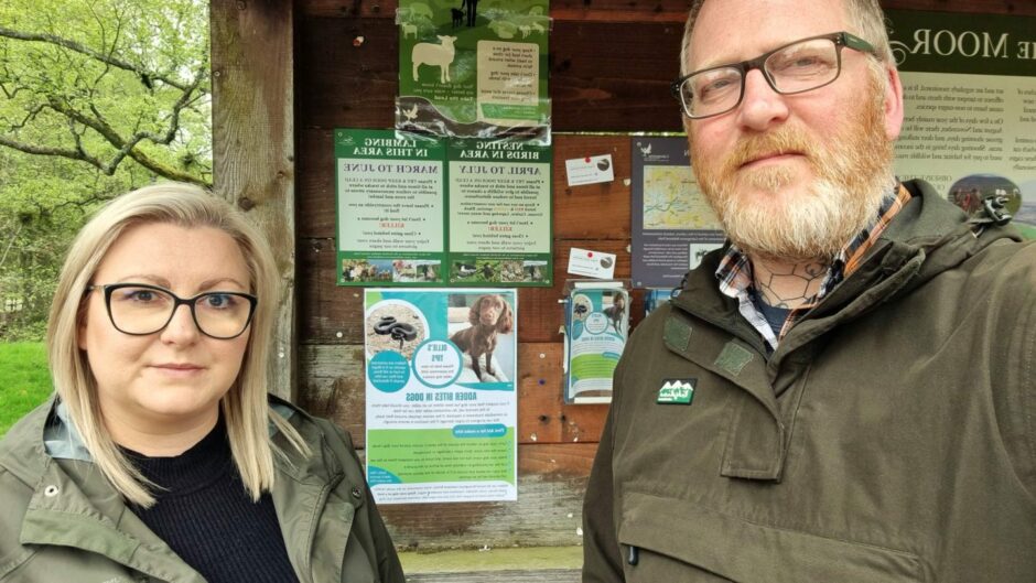 Iwona Beaton with her husband Lee Beaton at Glen Esk noticeboard where they stuck up Ollie's tips poster. 