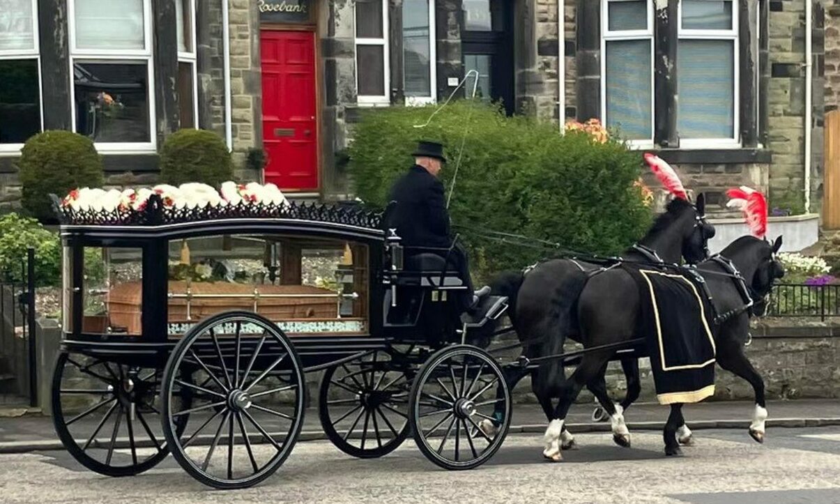 A horse-drawn hearse took Mary Mitchell's coffin through the streets of Kirkcaldy in its way to the crematorium.