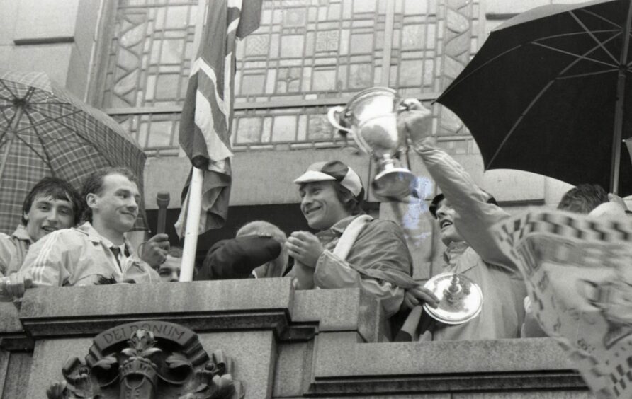 Paul Sturrock was among the players given a huge cheer with the trophy at the City Square. Image: DC Thomson.