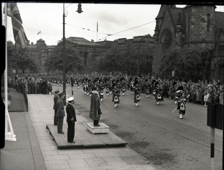People turned out to watch the coronation parade in Dundee. Image: DC Thomson.
