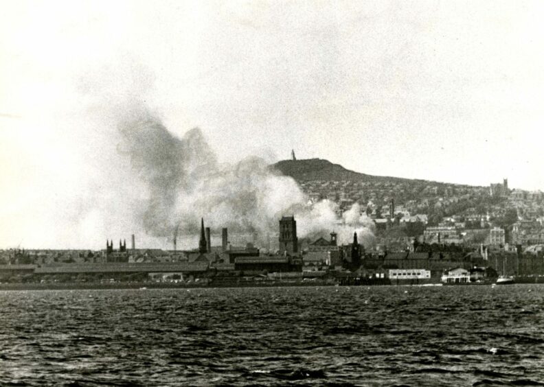 The Dundee Rep fire could be seen for miles in June 1963, with smoke billowing up in the air that could be seen from Fife. Image: DC Thomson.