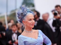 Dame Helen Mirren debuts blue hair look on opening day of Cannes (Vianney Le Caer/Invision/AP)