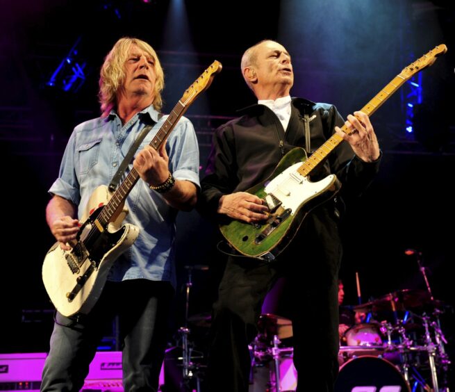 The band on stage as Status Quo perform an unforgettable set at Montrose East Links on May 23 2014. Image: DC Thomson.