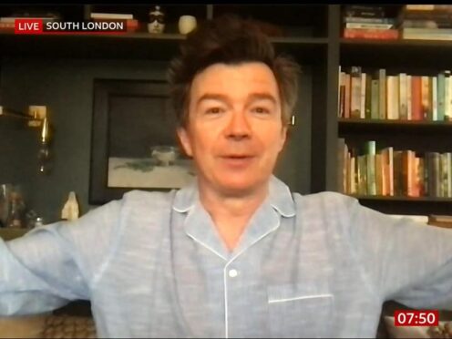 Rick Astley on the TV in his pyjamas (BBC/PA)