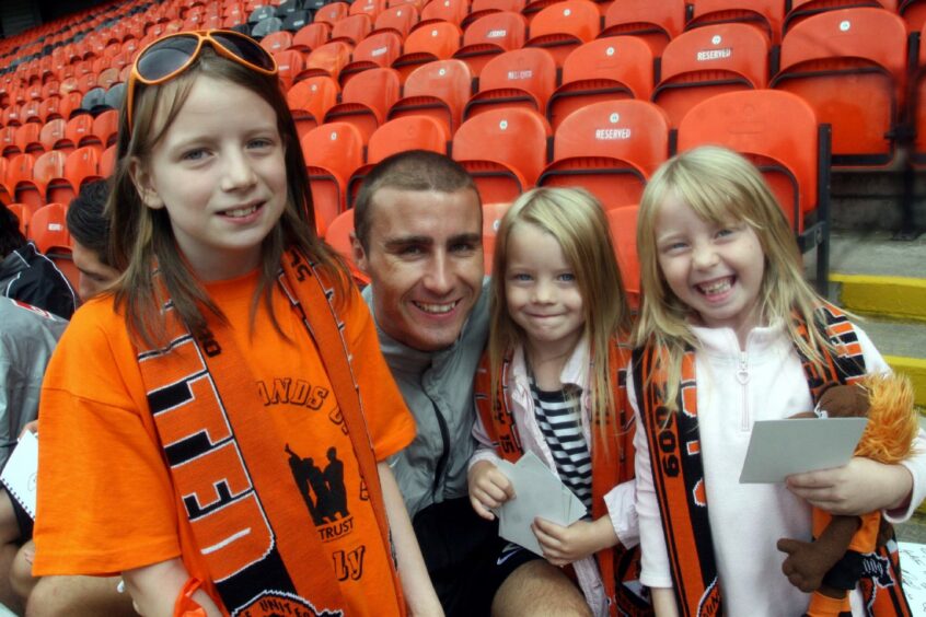United defender Sean Dillon poses with a group of young fans at the 2010 event. Image: DC Thomson.