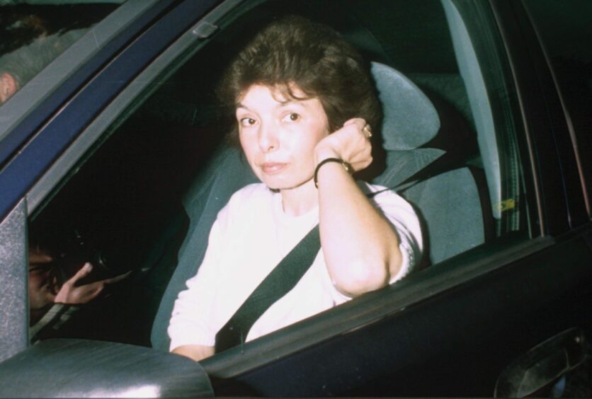 Deborah Parry, pictured in a car, returned to work in nursing when she was freed from Saudi Arabia. Image: Shutterstock.