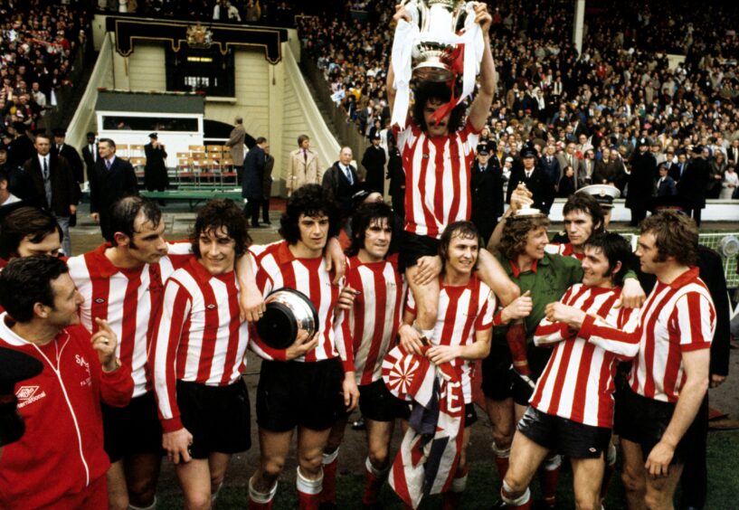 Sunderland's captain Bobby Kerr held aloft by his team-mates following the 1973 FA Cup final win. Image: PA.