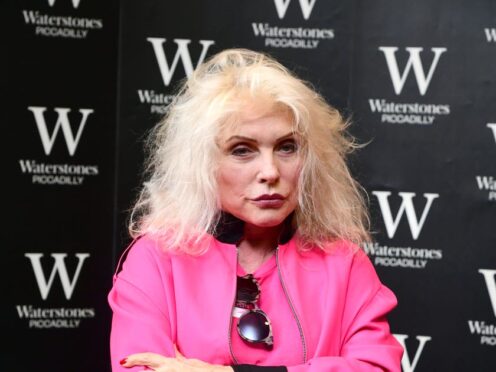 Debbie Harry signs copies of her new book Face It at Waterstones Piccadilly in London. PA Images Photo. Picture date: Friday October 18, 2019. The book details her rise to fame and the often-fraught history of new wave band Blondie. Photo credit should read: Ian West/PA