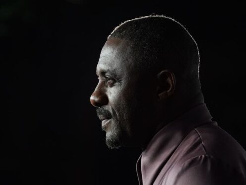 Idris Elba says everyone wanted to fight him at school (PA)