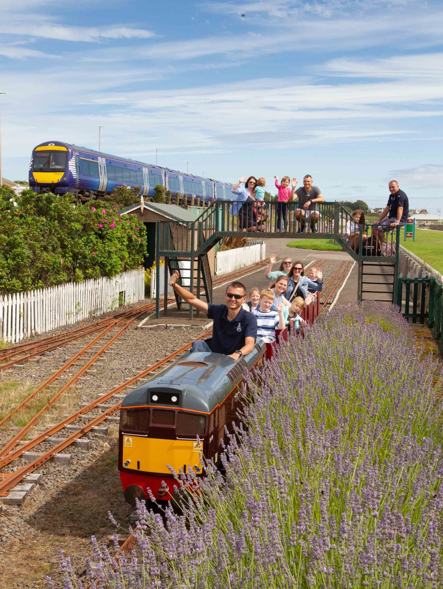 John Kerr taking families for a ride in the sunshine before the final whistle blew for Kerr's miniature railway in 2020. Image: DC Thomson.