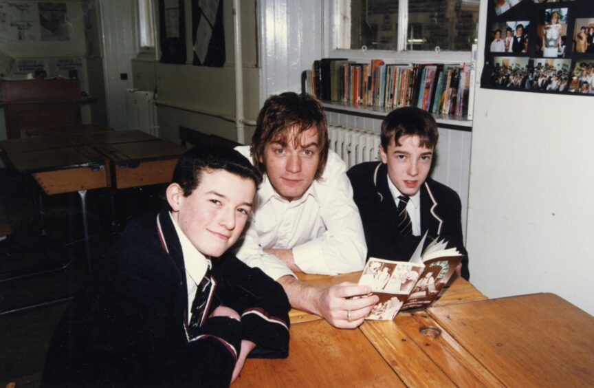 Ewan with pupils Michael Rae and Ziggy Payton who were performing in Tom Sawyer. Image: DC Thomson.