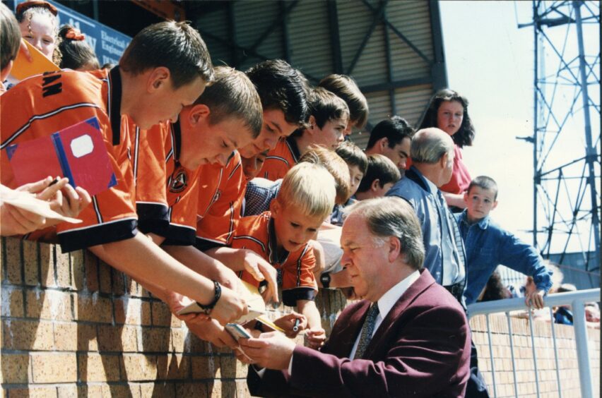 Brown signing autographs for Dundee United fans at the club's open day in 1996. Image: DC Thomson.