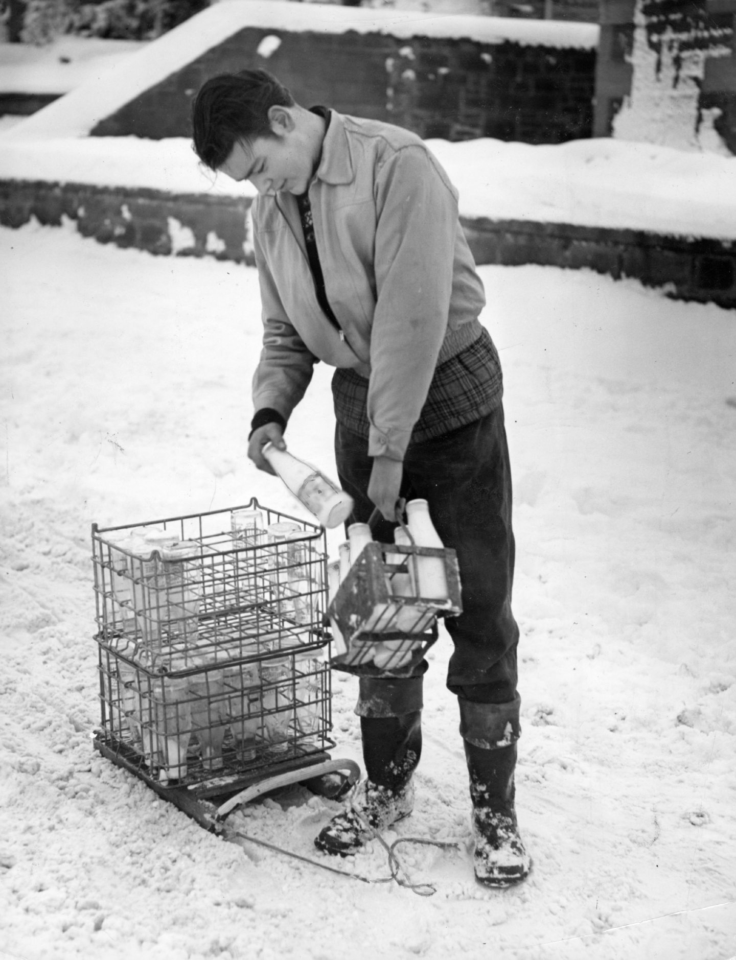 William Buchan delivering milk in the snow in the lochee area of dundee