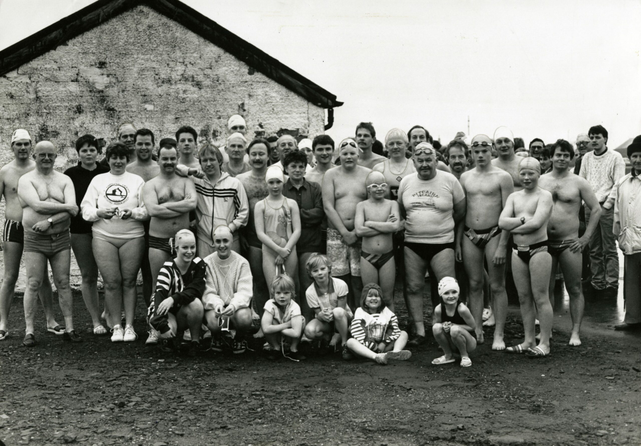 Black and white photo of the The Phibbies swimming club in 1990.
