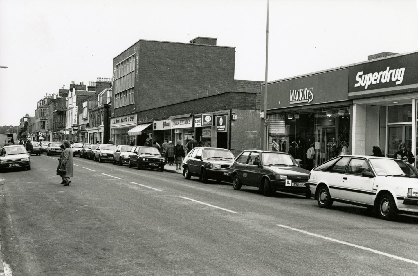 Black and white photo of shops in Brook Street 