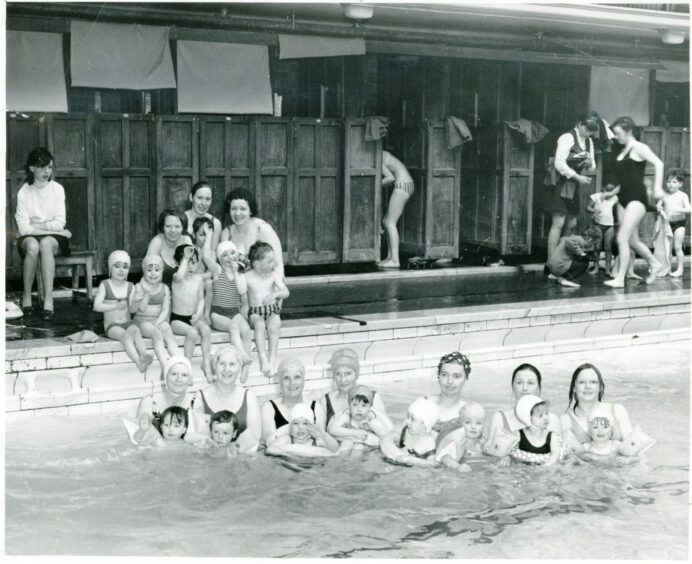 Youngsters and adults in the Central Baths, which were demolished in 1975, after the Olympia Leisure Centre opened. Image: DC Thomson.