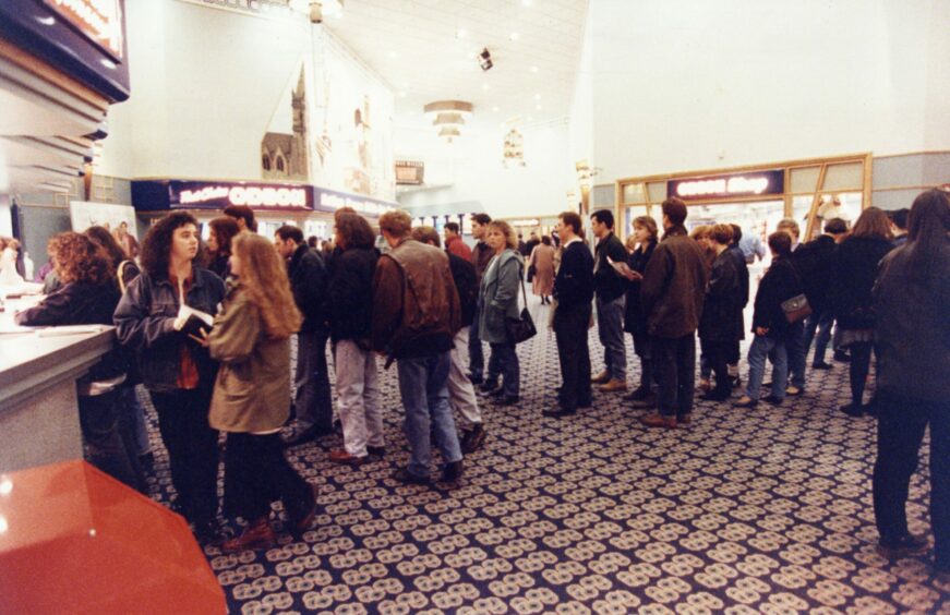 Film fans queue at Dundee Odeon.