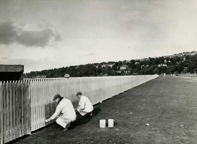 Painters at Dundee's Riverside Airstrip. Image: DC Thomson.