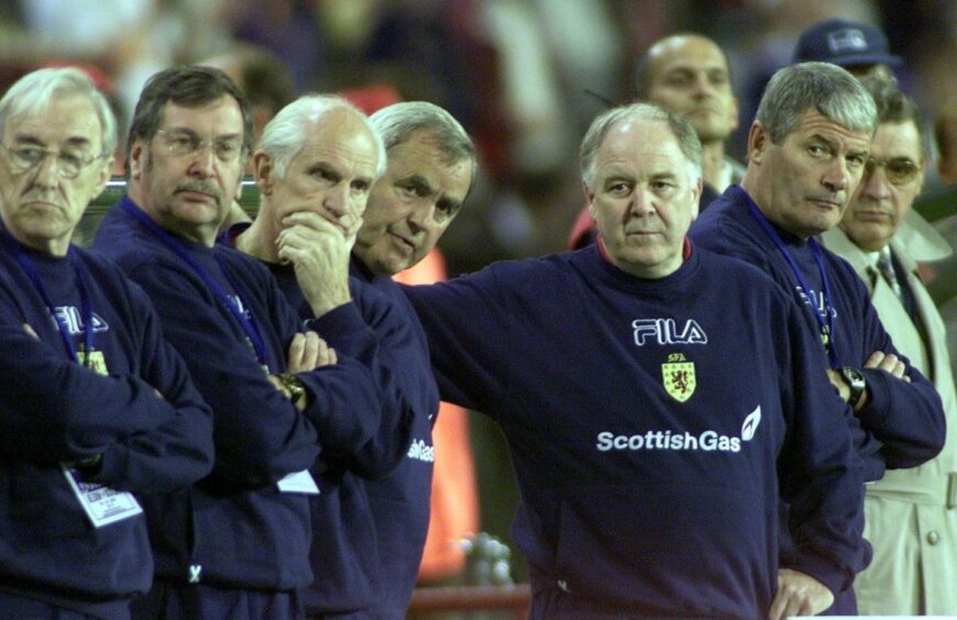 Scotland manager Craig Brown with his colleagues after the Group Six World Cup Qualifying game against Belgium in Brussels in 2001.