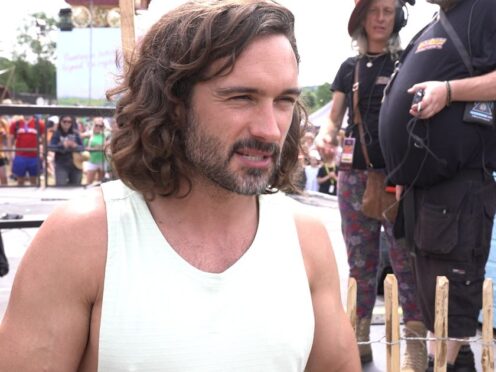 Joe Wicks is putting revellers through their paces at Glastonbury (PA)