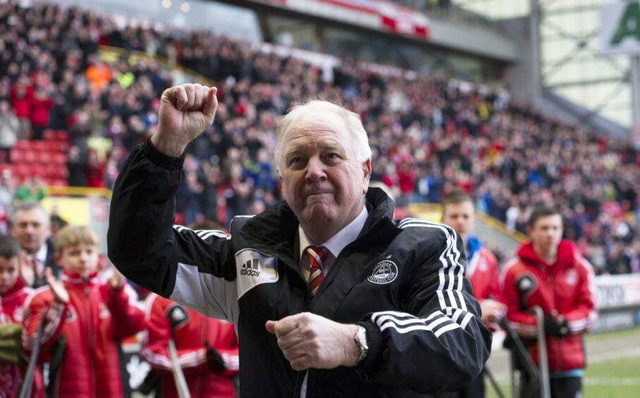 Brown salutes fans at Pittodrie after his final game in charge of Aberdeen.