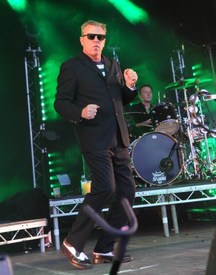 Suggs on stage at MoFest in 2015.