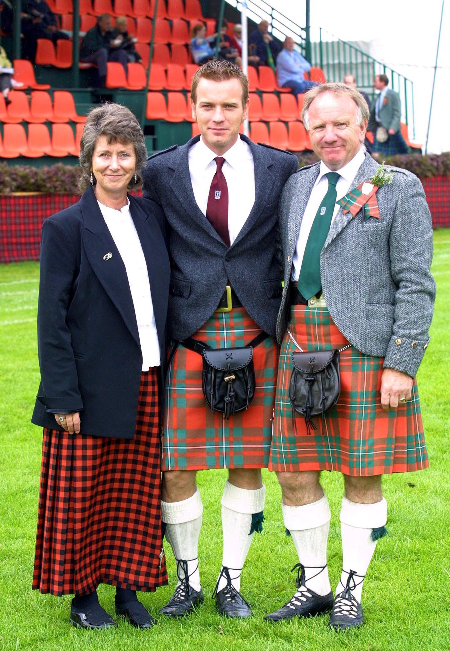 Ewan McGregor with his mother Carol and father Jim when he returned again to Crieff in 2001. Image: Shutterstock.