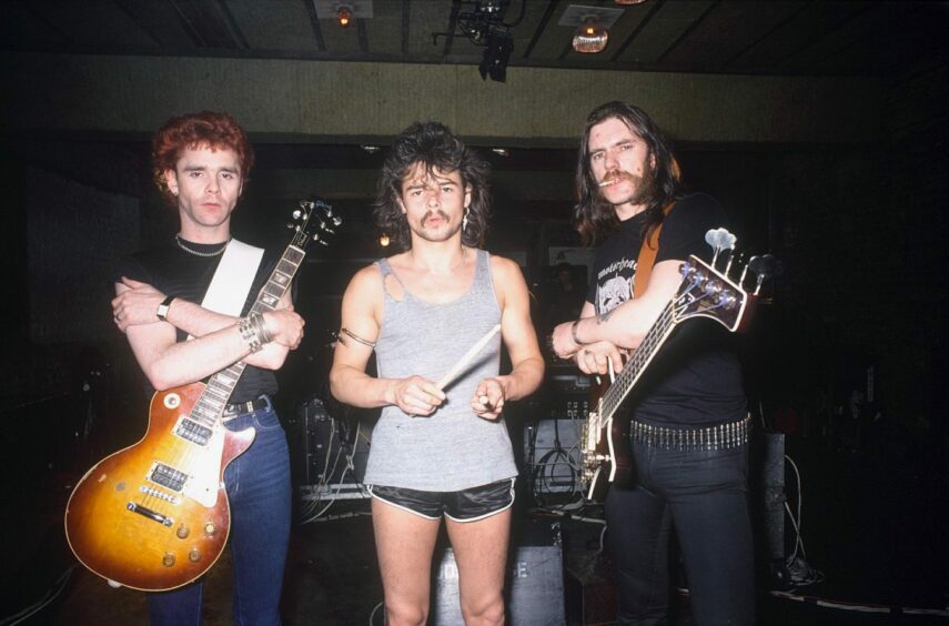 Glaswegian Brian Robertson, Phil Taylor and Lemmy in 1982, when he replaced Fast Eddie. Image: Shutterstock.