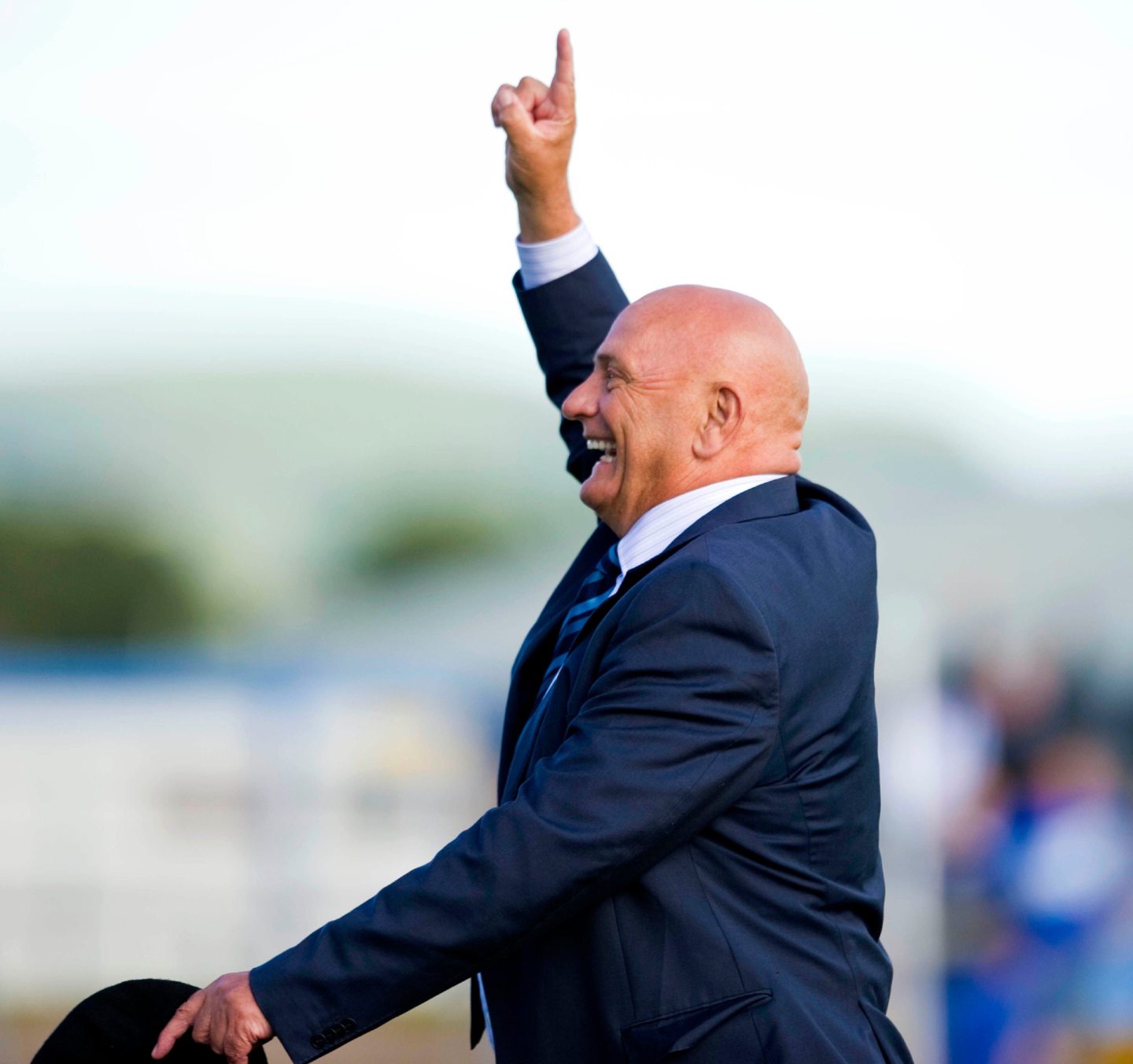 Dick Campbell salutes the fans after a victory that increased the pressure on Rangers and Ally McCoist. Image: SNS.