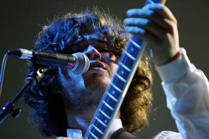 An up-close shot of lead singer of The View, Kyle Falconer, on stage at the Caird Hall. 