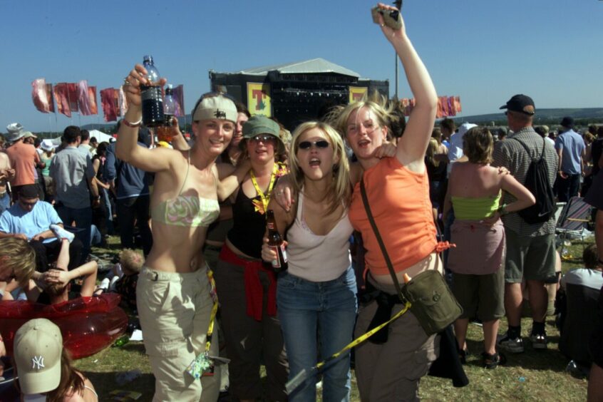 Fans party at T in the Park in 2003.