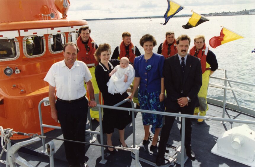 Ross Munro of Dundee is christened on the Broughty Ferry lifeboat. Image: DC Thomson.