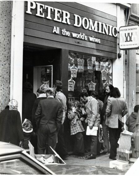 Peter Dominic wine shop in Union Street, Dundee was busy with shoppers on Hogmanay 1973.