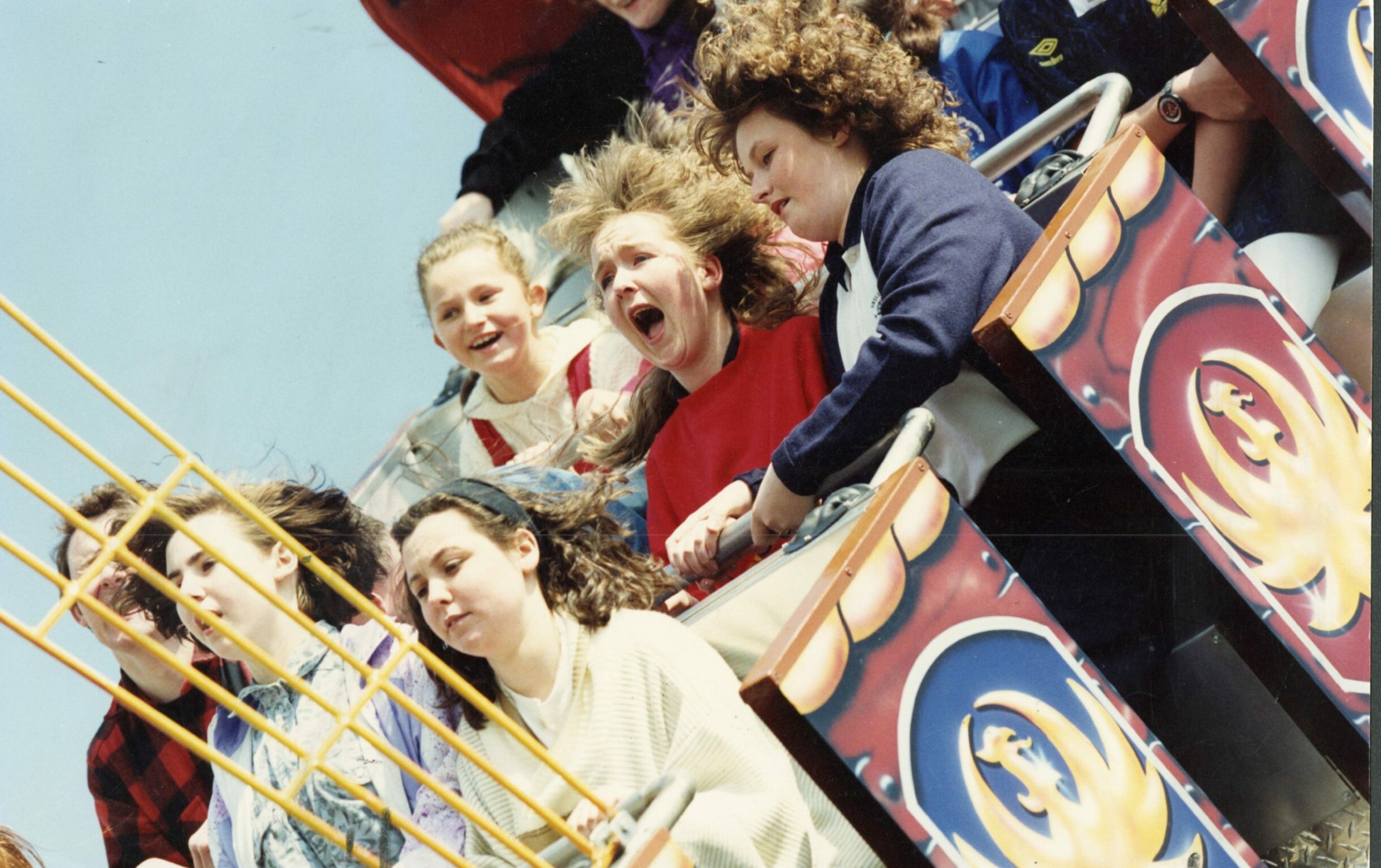 People screaming on a carnival ride at Caird park