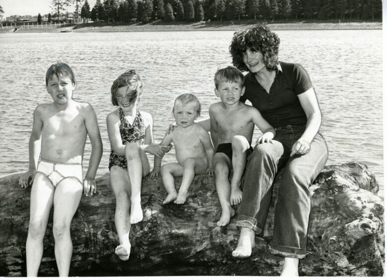 A family enjoying the sun at Clatto Country Park in 1981. 