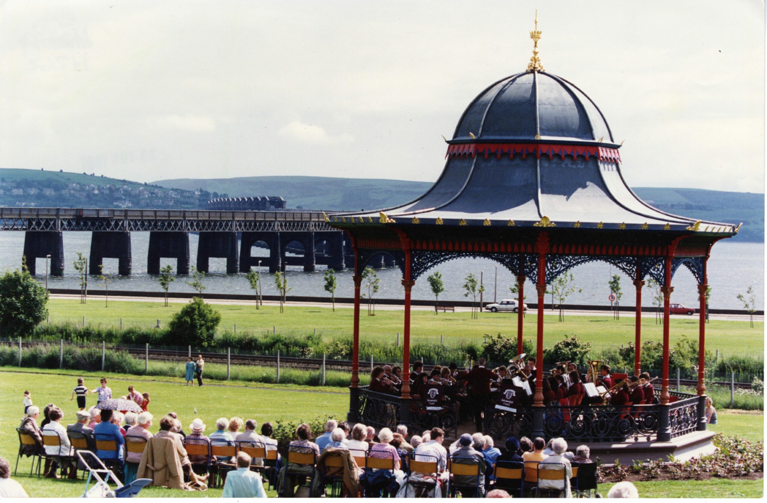 A crowd watching Arbroath Instrumental Band performing at the bandstand 