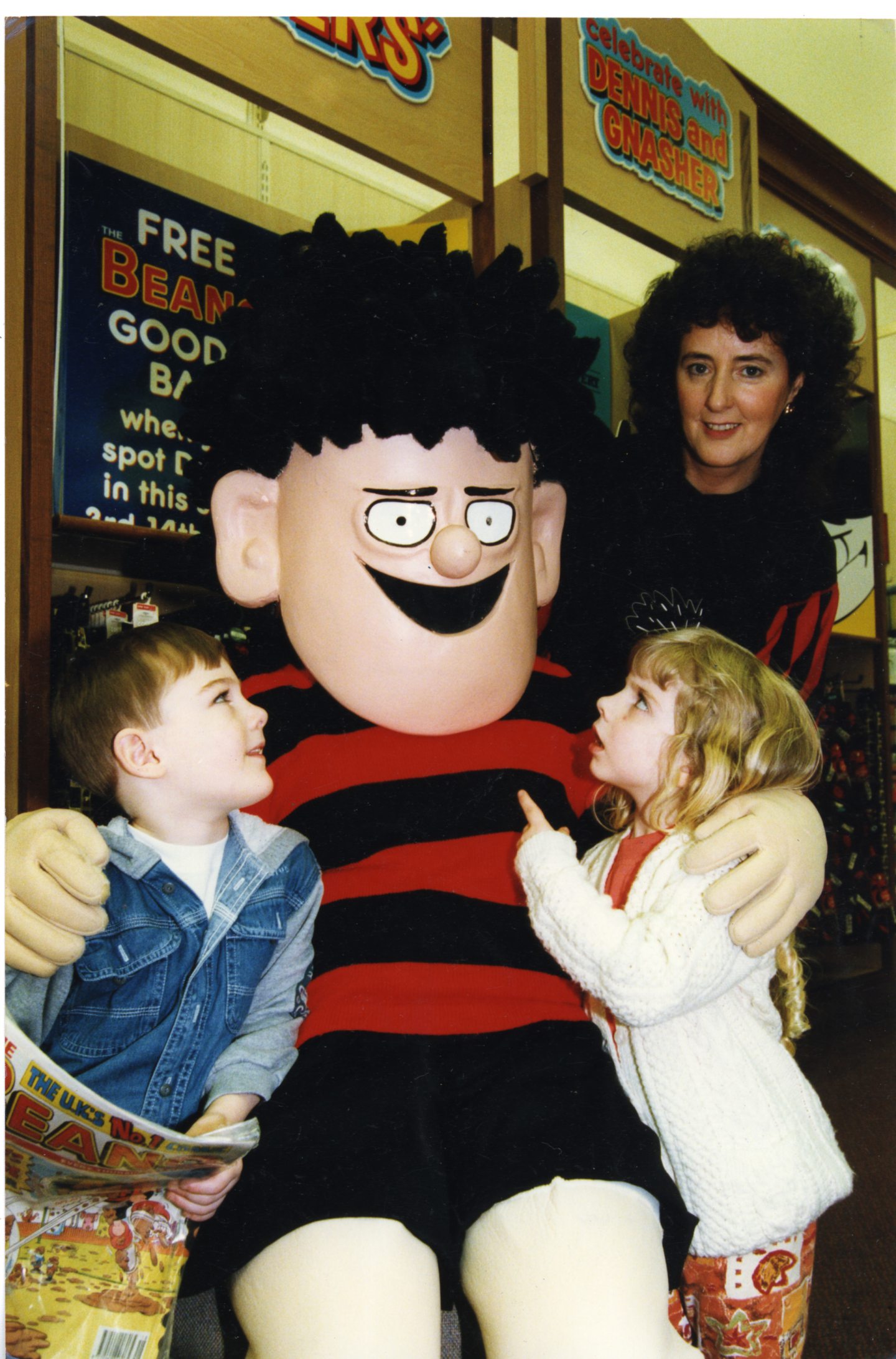 Dennis the Menace sits with some of his fans while visiting M&amp;S in Dundee in 1996. Image: DC Thomson.