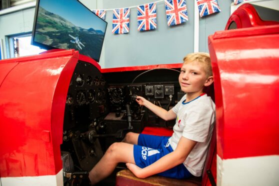 Callan Fleming had a go in an early version of a flight simulator at Montrose air station.