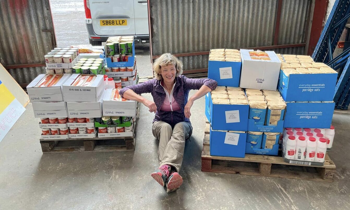 Lindsey pictured in the warehouse at Errol with goods about to be sent on Ukraine.