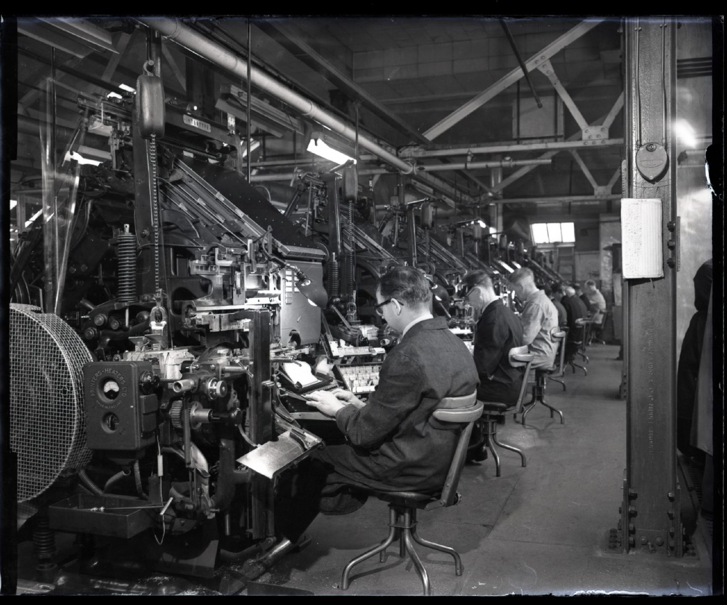 Linotype operators in the Meadowisde caseroom in January 1958.