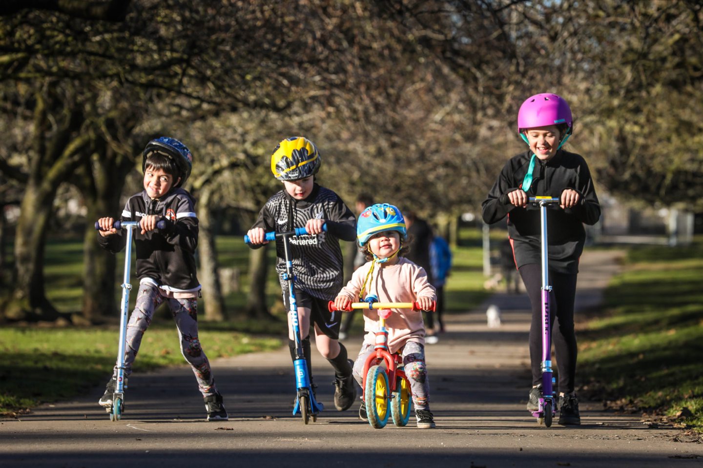Children on scooters 
