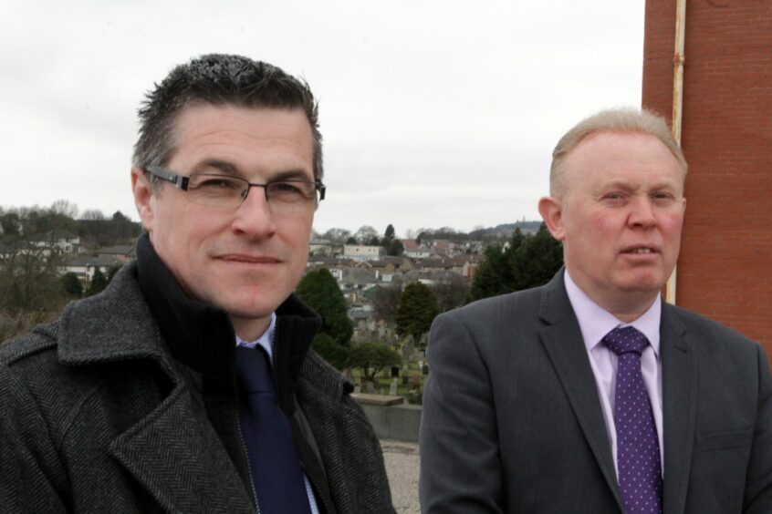 DC Mike Proctor and DCI Andy Guy during their visit to find answers in Dundee in 2016. Image: DC Thomson.
