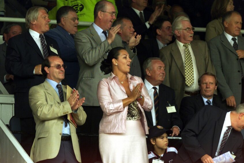 Di Stefano in the stands at a football match